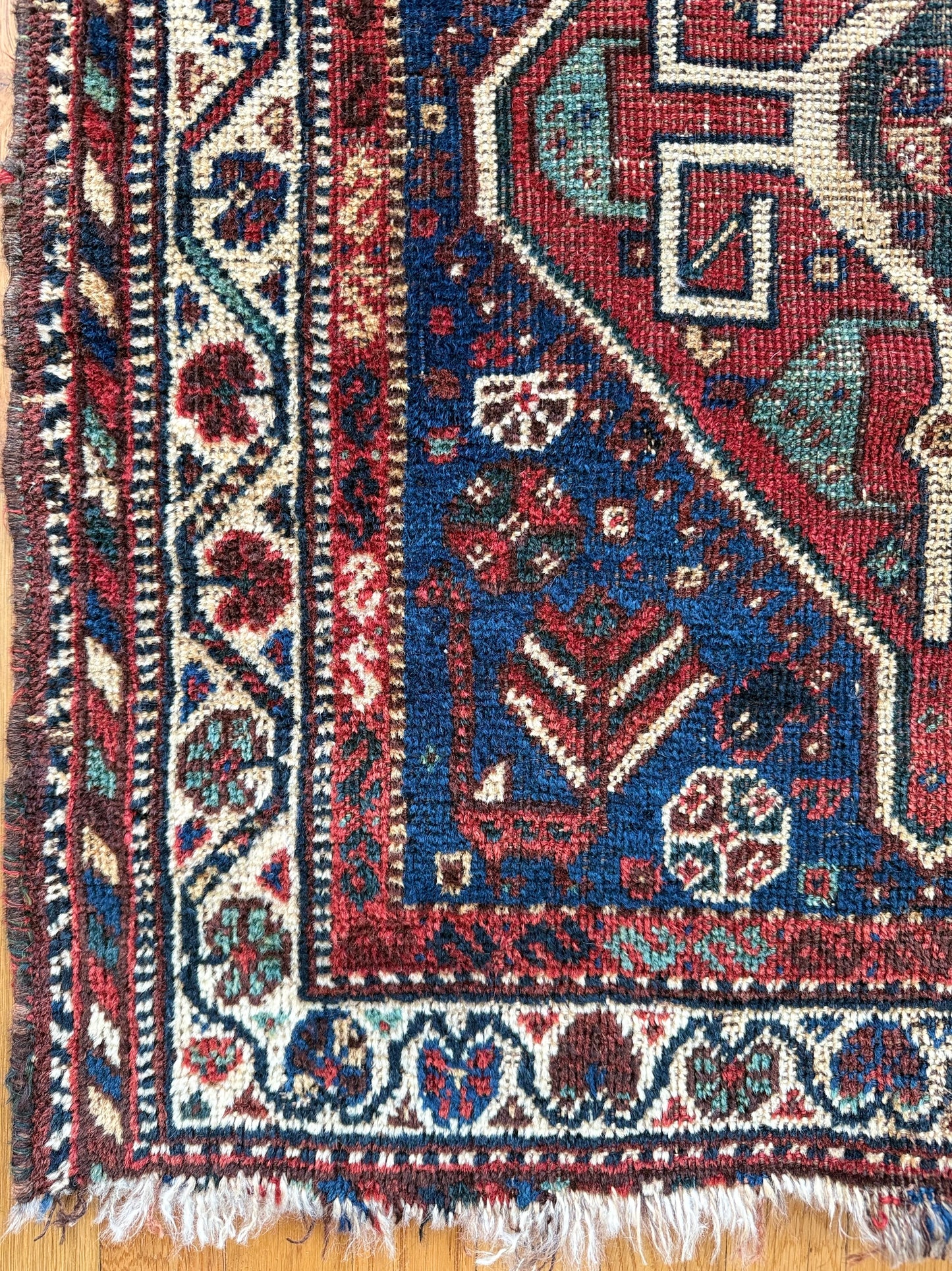 1006 | Striking Antique Caucasian Kuba in Deep Indigo Blue with Fiery Red Medallions & Colorful Tribal Borders | 2.9 x 4.6