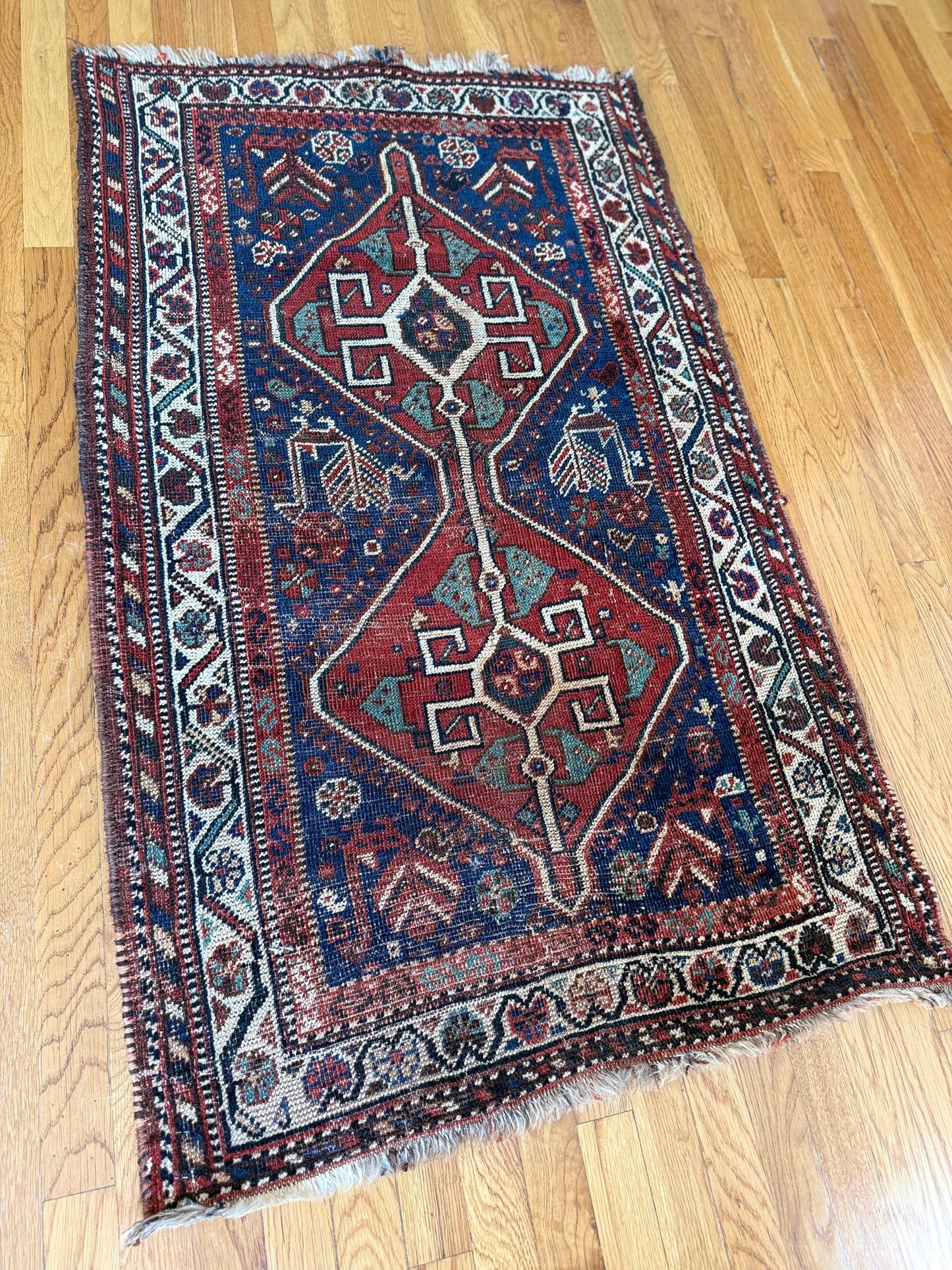 1006 | Striking Antique Caucasian Kuba in Deep Indigo Blue with Fiery Red Medallions & Colorful Tribal Borders | 2.9 x 4.6