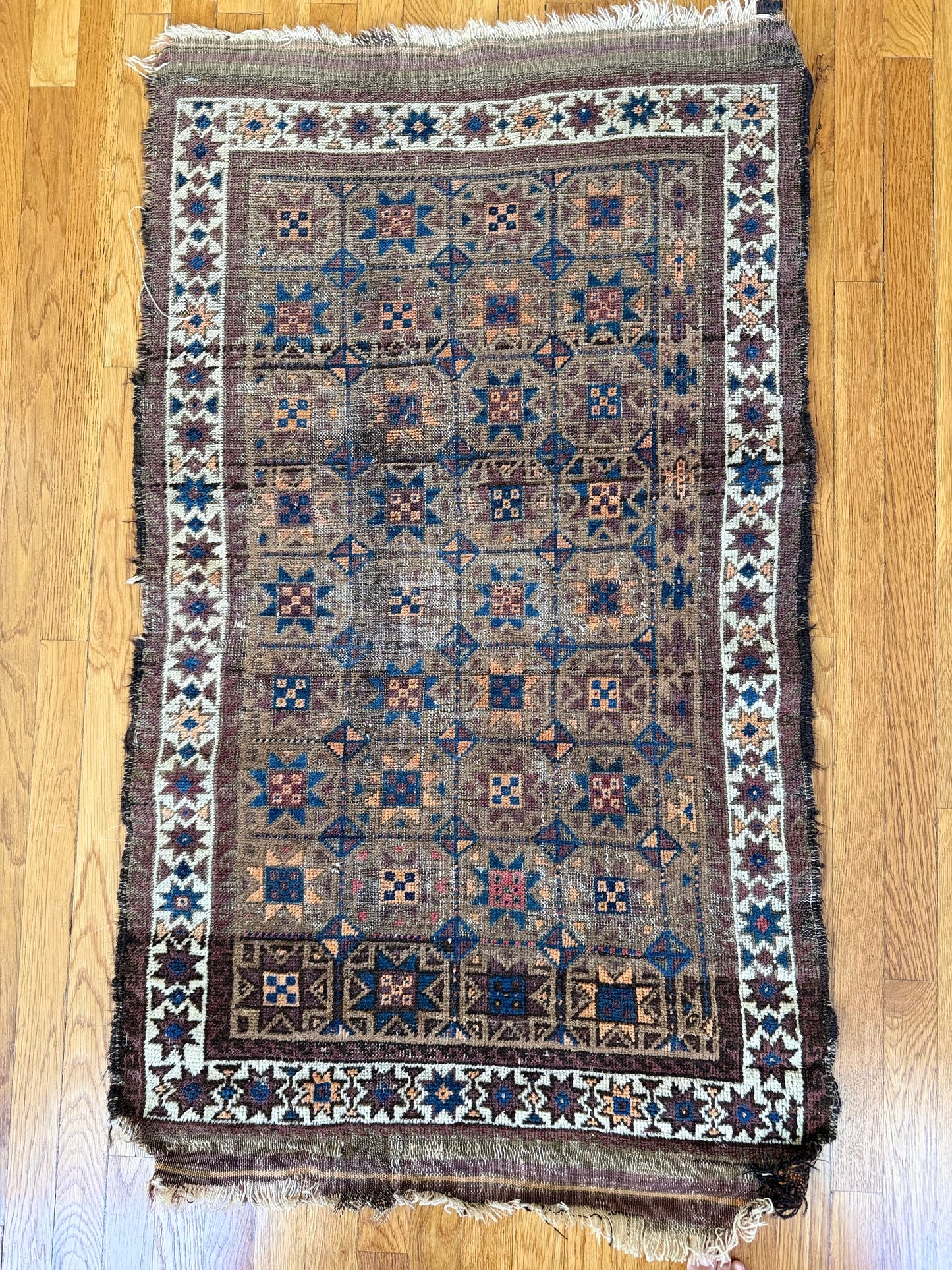 1026 | Beautifully Beat-Up Antique Baluch with Indigo Stars & Desert Patina | 2.7 x 4.5
