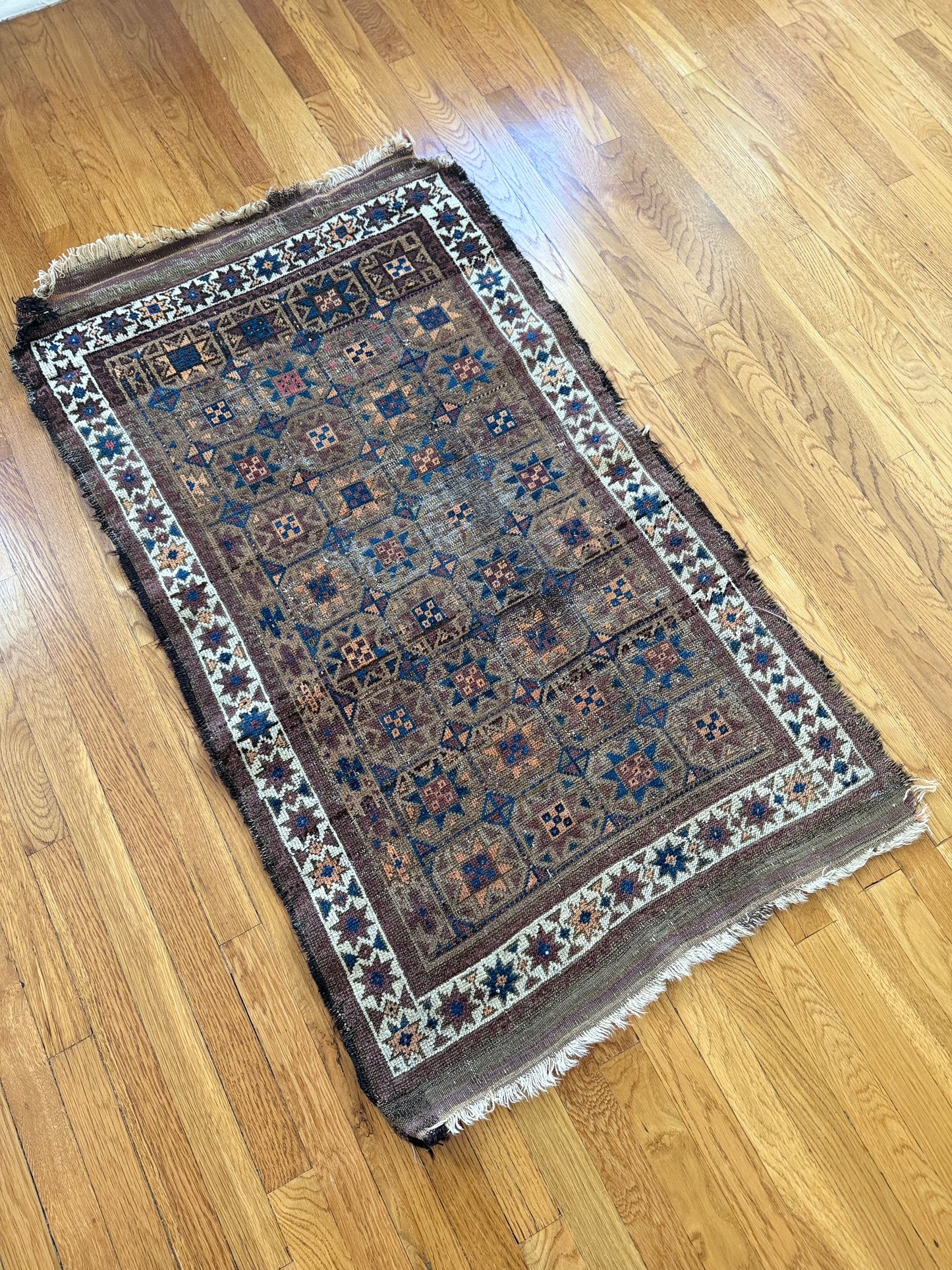 1026 | Beautifully Beat-Up Antique Baluch with Indigo Stars & Desert Patina | 2.7 x 4.5