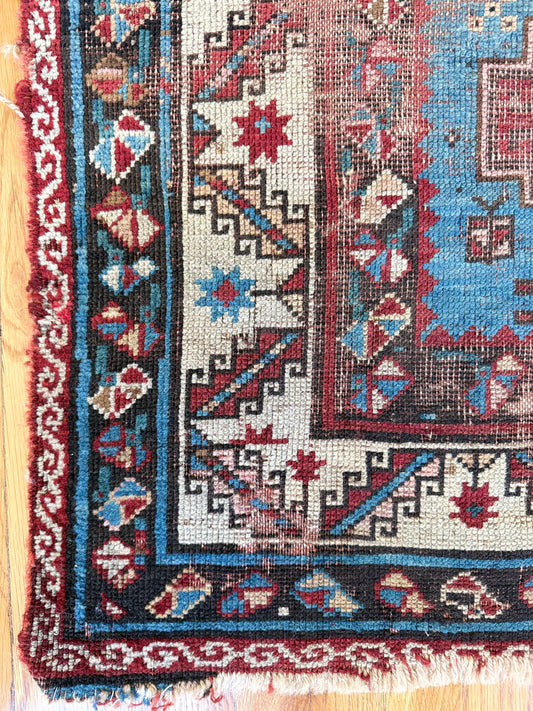 1040 | Survived Everything Antique Caucasian Rug with Sky Blue Medallions & Battle Scars | 3.5 x 6.5