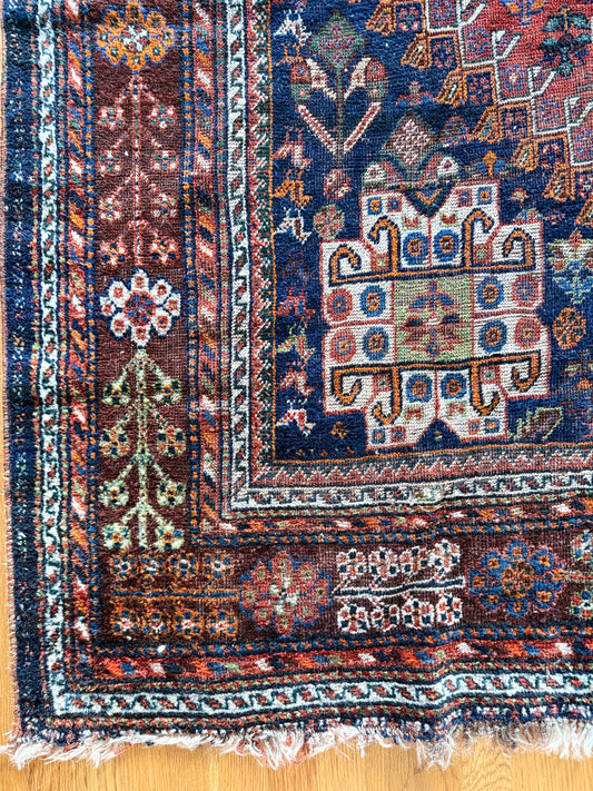 1061 | Wild Child Antique Qashqai Rug with Brick Red Field & Midnight Corner Medallions | 7.1 x 10.2