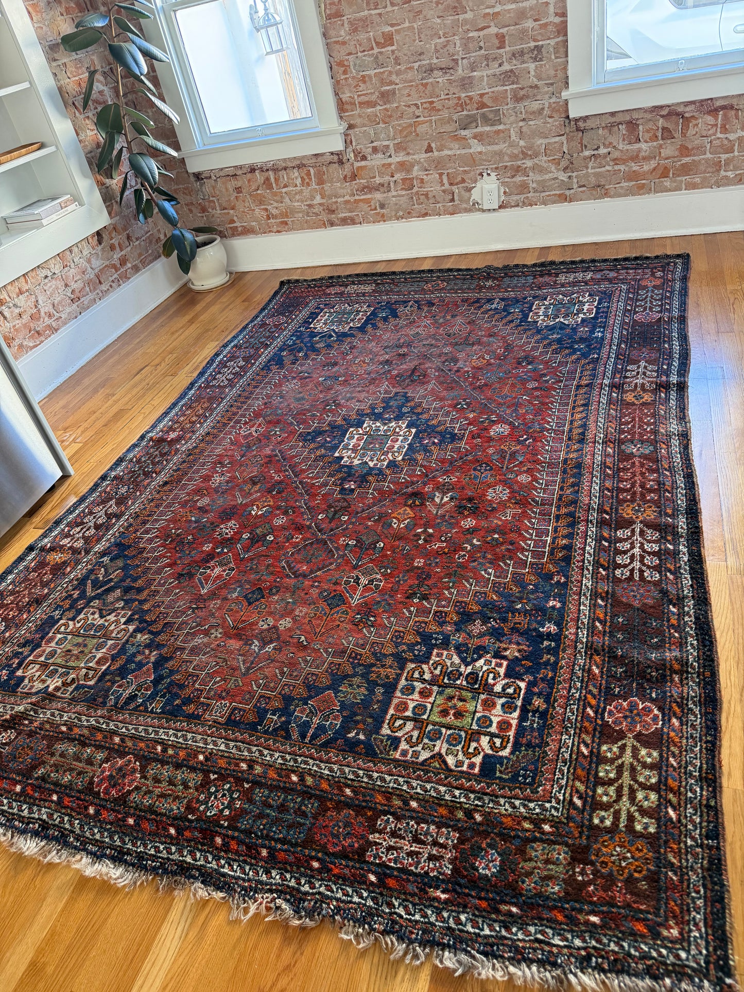1061 | Wild Child Antique Qashqai Rug with Brick Red Field & Midnight Corner Medallions | 7.1 x 10.2