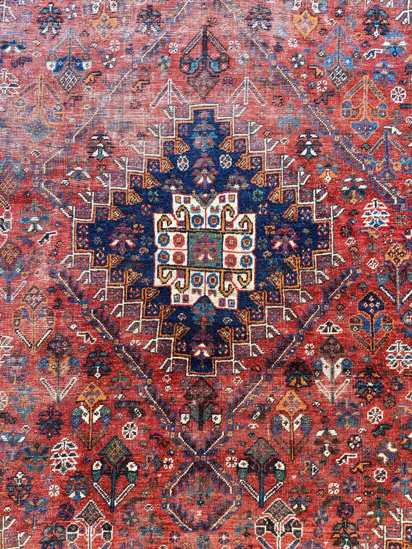 1061 | Wild Child Antique Qashqai Rug with Brick Red Field & Midnight Corner Medallions | 7.1 x 10.2