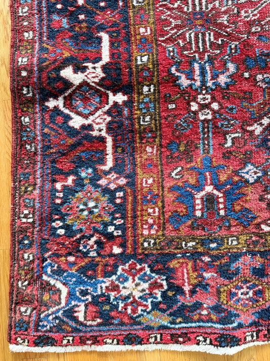 1062 | Red-Blooded Antique Heriz Rug with Navy Border & Wild Floral Field | 7.2 x 10.3